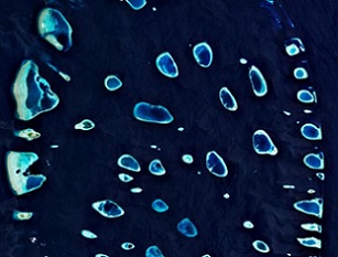 The Maldives, seen in part from above, is comprised of 1,192 islands. The tiny island nation also has the world’s highest levels of microplastics in its beach sand and offshore waters. PHOTOGRAPH COURTESY EUROPEAN SPACE AGENCY