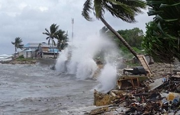 Waves crash into the Uliga back road sea wall in the Marshall Islands, 27-11-19. Photo: RNZ Pacific / Hilary Hosia