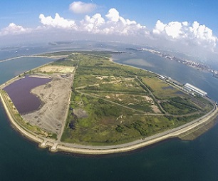 An aerial view of Semaku landfill that was created by filling in part of the sea between two of Singapore’s offshore islands, Pulau Se-makau and Pulau Sakeng. Credit - Island Nation.