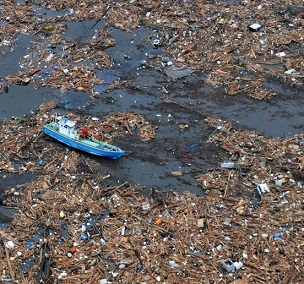 Some of the debris washed out to sea by Japan’s 2011 tsunami. Some of it came ashore the following year in the US. Photograph: Science History Images/Alamy