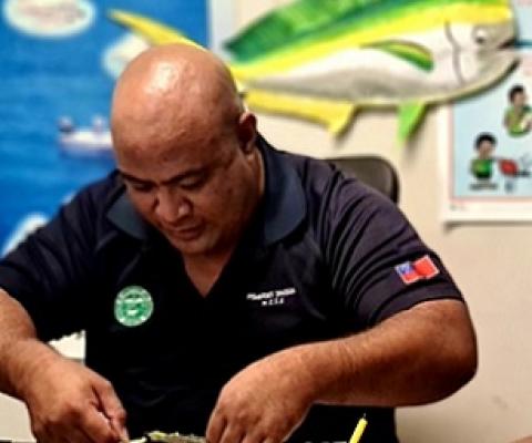 Ministry of Agriculture and Fisheries (MAF) officials measure confiscated crab species. (Photo: MAF/Supplied)