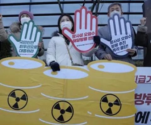 Environmental activists protesting against the decision to release the water. The plans have faced strong opposition. Photograph: Ahn Young-joon/AP