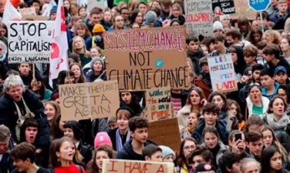 Climate protesters in Lausanne, Switzerland, days before the start of the Davos summit. Photograph: Stefan Wermuth/AFP via Getty Images