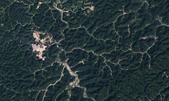 o access the coal contained in the Appalachian Mountains in southern West Virginia, extractive companies engage in a controversial mining method called "mountaintop removal," which Scientists have found that this process negatively impacts groundwater and biodiversity. Credit - NASA Earth Observatory