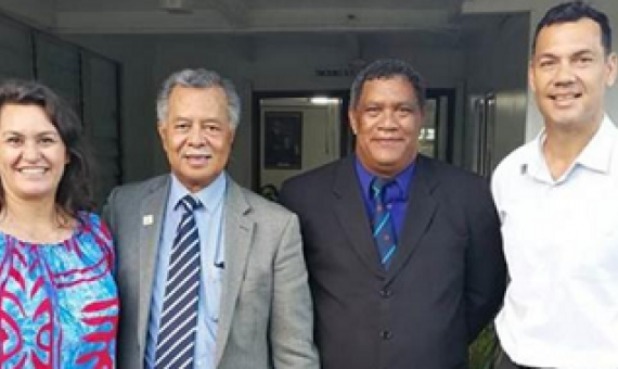 Marine scientist Jacqueline Evans, Prime Minister Henry Puna, House of Ariki president Travel Tou Ariki and rugby star Kevin Iro just after the Cook Islands government passed the Marae Moana Act establishing the country’s entire exclusive economic zone as a mixed-use marine protected area in 2017. Credit - Marae Moana Coordination Office.