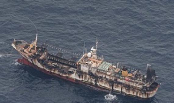 A fishing boat is seen from an aircraft of the Ecuadorian navy after a fishing fleet of mostly Chinese-flagged ships was detected in an international corridor that borders the Galapagos Islands’ exclusive economic zone, in the Pacific Ocean August 7, 2020. Picture taken August 7, 2020. REUTERS/Santiago Arcos