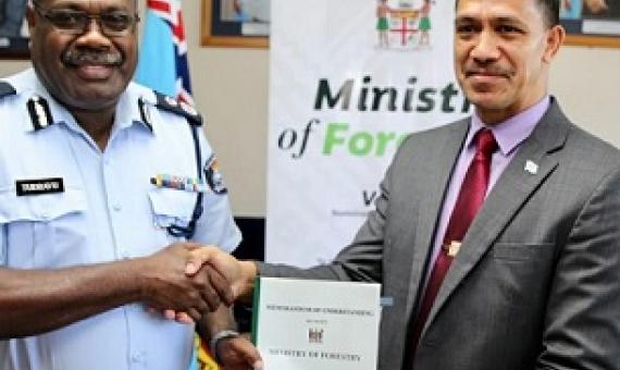 The signing was officiated by the Ministry of Forestry’s Permanent Secretary Mr. Pene Baleinabuli and the Acting Commissioner of Police Rusiate Tudravu. Credit - https://www.fijitimes.com/