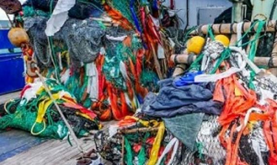 Two large fish-aggregating devices sit on the deck of a tuna purse-seine fishing vessel. Among the components are used salt bags, which are made of plastic. Photo: Francisco Blaha.