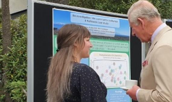 Prince Charles unveils a plaque for the Christ Church Cathedral with Bishop Peter Carrell on 22 November, 2019. (PHOTO: Pool / AFP / Marty Melville)   School children wait for Prince Charles to arrive at a Christ Church Cathedral's reception at Tūranga Library on November 22, 2019. (PHOTO: Pool / AFP / Marty Melville)
