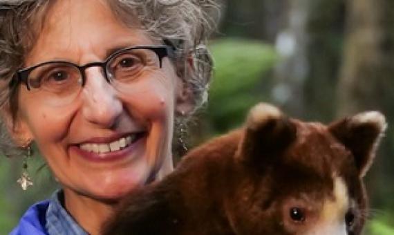 Dr. Lisa Dabek holds a Matschie’s tree kangaroo. Image by Jonathan Byers courtesy of the Tree Kangaroo Conservation Program.