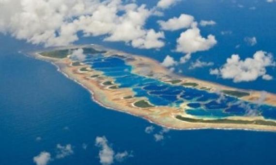 An underwater paradise in the remote Pacific Ocean that includes the sea around Caroline Island, seen here, will be protected—thanks in part to National Geographic’s Pristine Seas project. PHOTOGRAPH BY BRIAN SKERRY